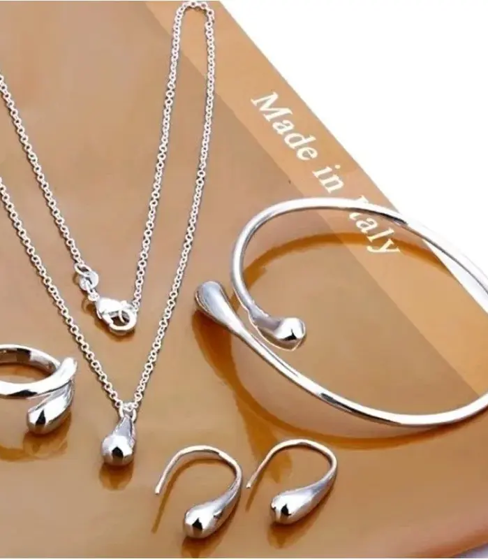 Moda S925 pendientes de aguja de plata anillo pulsera conjunto personalidad Simple mujer gota de agua conjunto de joyería de cuatro piezas para regalo de mujer 1