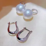 Huitan-pendientes colgantes de perlas de imitación para mujer, joyería elegante de lujo de Color plateado con circonita cúbica ostentosa, tendencia 4