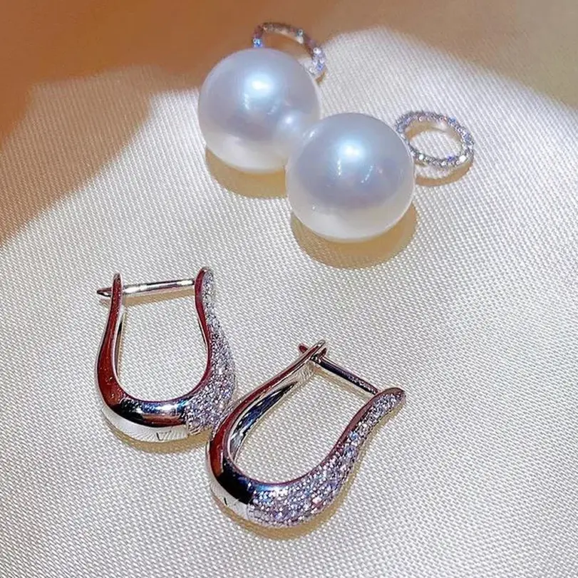 Huitan-pendientes colgantes de perlas de imitación para mujer, joyería elegante de lujo de Color plateado con circonita cúbica ostentosa, tendencia 4