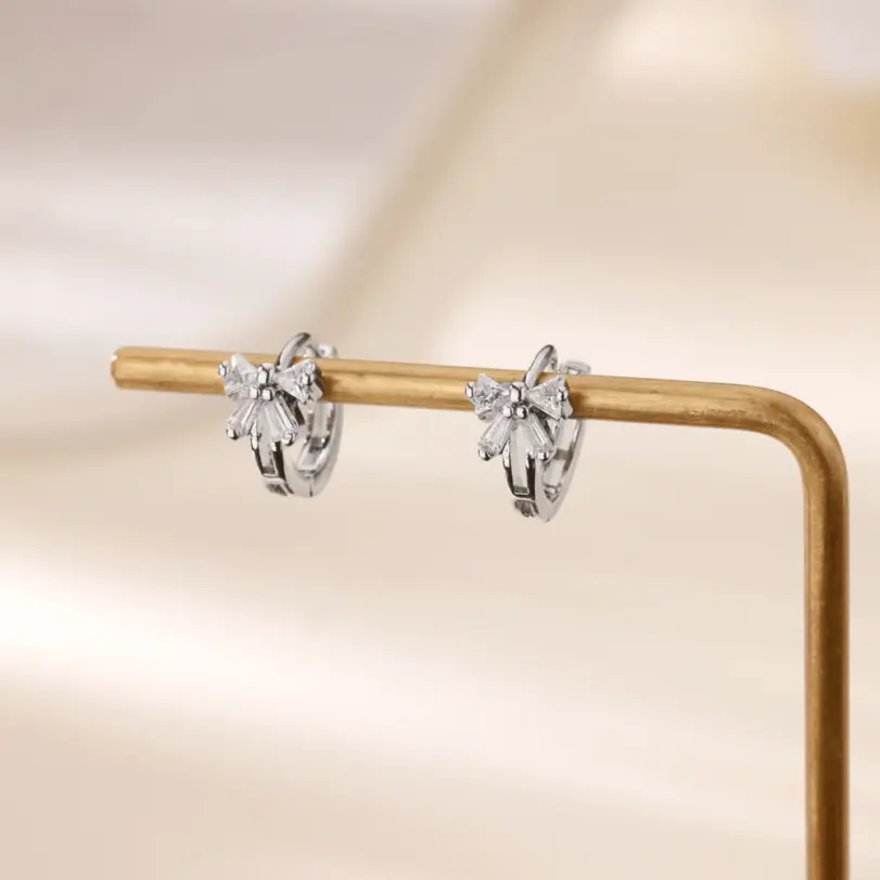 Pendientes elegantes con lazo de circón para mujer, aretes con lazo de Color dorado de acero inoxidable, regalo de joyería impermeable para boda de lujo 3