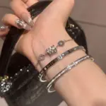 1 Uds. Pulsera apilada con números romanos con incrustaciones de circón brillante para mujer, accesorios de joyería exquisitos de moda para uso diario 2 1 Uds. Pulsera apilada con números romanos con incrustaciones de circón brillante para mujer, accesorios de joyería exquisitos de moda para uso diario 2