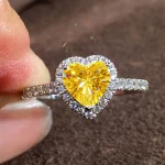Huitan-anillos estéticos brillantes con diseño de corazón para mujer, accesorios para dedo de circonia cúbica brillante, joyería de compromiso exquisita 20