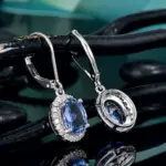 Huitan-pendientes colgantes de lujo para mujer, ovalados, azules, CZ, accesorios nobles para mujer, pendientes elegantes para fiesta, joyería de moda para uso diario 2