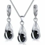 Conjunto de pendientes y collar para mujer, colgante de aleación de cobre de viento ligero de lujo, piedra de cristal negro, sección de Clip para oreja, joyería combinada, 3 uds. 1