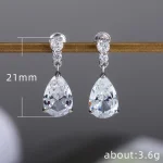 precioso AAA Cubic Zirconia gota de agua encanto mujeres gota pendiente boda joyería blanco/púrpura pendientes de alta calidad 6 precioso AAA Cubic Zirconia gota de agua encanto mujeres gota pendiente boda joyería blanco/púrpura pendientes de alta calidad 6