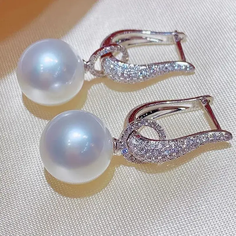 Huitan-pendientes colgantes de perlas de imitación para mujer, joyería elegante de lujo de Color plateado con circonita cúbica ostentosa, tendencia 3
