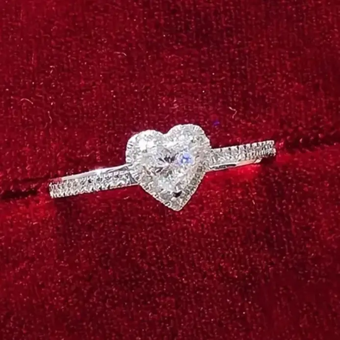 Huitan-anillos de corazón de Color plateado brillante para mujer, anillos femeninos de boda simples y elegantes, joyería de regalo de fiesta 1