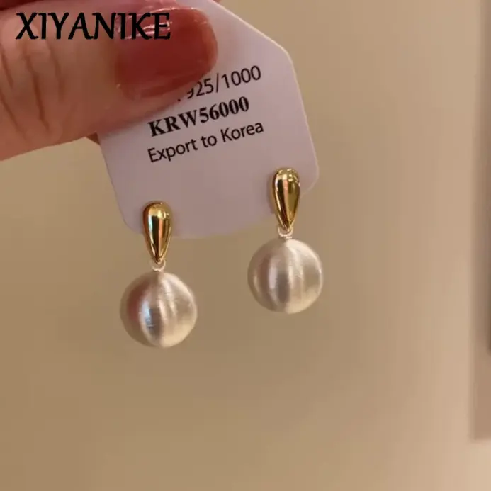 Pendientes XIYANIKE con colgante de bola cepillada de Metal contrastante de Color dorado y plateado para mujer, joyería nueva de moda, regalo para fiesta Rock 1