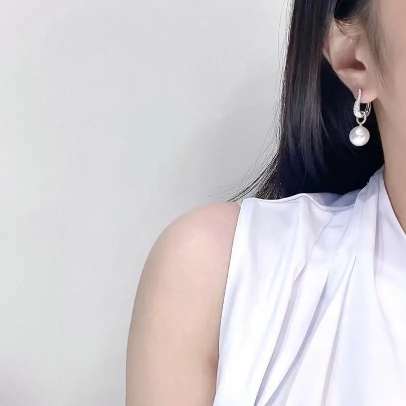 Huitan-pendientes colgantes de perlas de imitación para mujer, joyería elegante de lujo de Color plateado con circonita cúbica ostentosa, tendencia 5