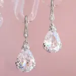 Huitan-pendientes colgantes de circonita de cristal con forma de gota de agua para mujer, diseño Simple y elegante, deslumbrantes CZ, joyería de moda 1
