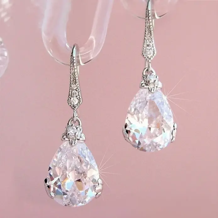 Huitan-pendientes colgantes de circonita de cristal con forma de gota de agua para mujer, diseño Simple y elegante, deslumbrantes CZ, joyería de moda 1