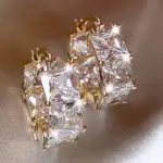 Pendientes de aro chapados en oro con circonita cúbica para mujer, lujosos regalos de joyería para fiesta Huggies 1