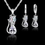 Juegos de joyas para mujer y niña, Plata de Ley 925 auténtica, cristal austriaco brillante, bonito collar con colgante de gato, pendiente Huggie 1
