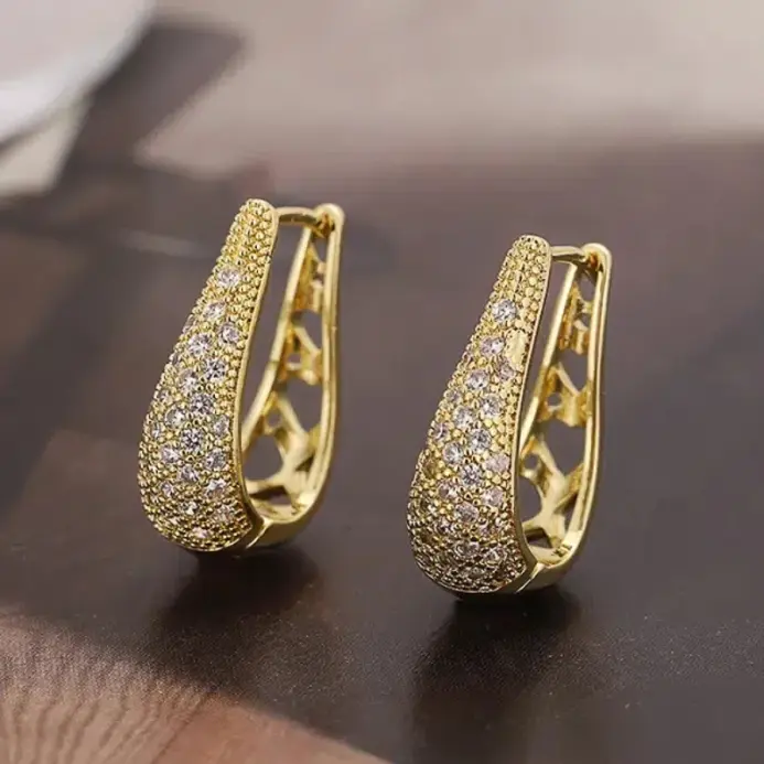 Huitan-pendientes de aro de Color dorado/plateado para mujer, accesorios de circonia brillante de lujo, joyería de fiesta con diseño calado delicado 1
