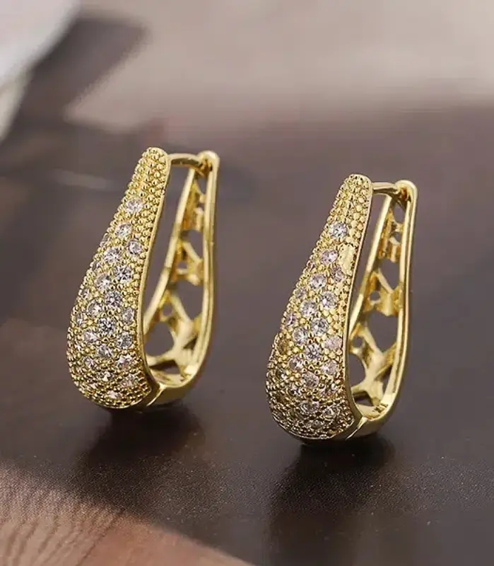 Huitan-pendientes de aro de Color dorado/plateado para mujer, accesorios de circonia brillante de lujo, joyería de fiesta con diseño calado delicado 1