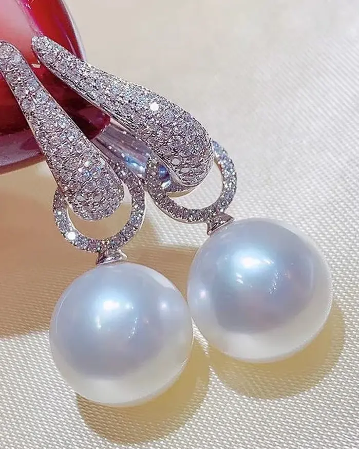 Huitan-pendientes colgantes de perlas de imitación para mujer, joyería elegante de lujo de Color plateado con circonita cúbica ostentosa, tendencia 1