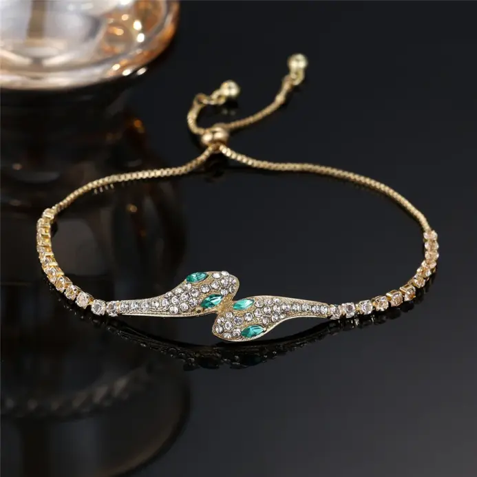🐍 Brazalete "Serpiente Mística" – Oro Rosa y Circonias Esmeralda 1