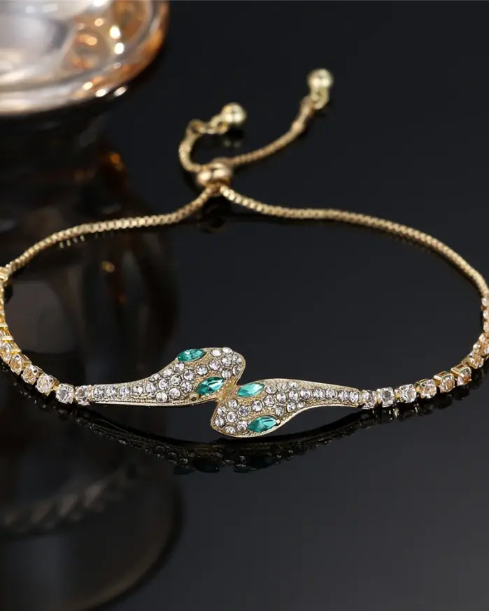 🐍 Brazalete "Serpiente Mística" – Oro Rosa y Circonias Esmeralda 1