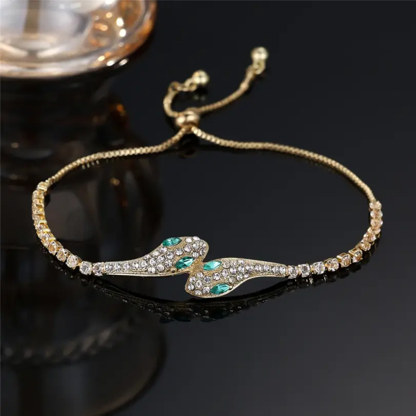 🐍 Brazalete "Serpiente Mística" – Oro Rosa y Circonias Esmeralda 1