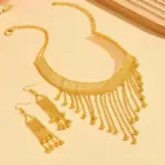Conjunto de Joyería Premium para Mujer: Collar Gargantilla y Pendientes de Borlas Doradas con Cadena de Malla y Flecos de Cuentas, Estilo Boho Étnico, Ideal para Verano y Playa 3