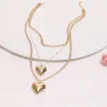Conjunto de 4 piezas: collar de cadena con colgante de doble corazón, pendientes y pulseras de múltiples capas, de color dorado, para mujer. 3