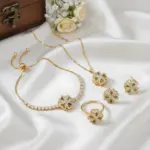 Juego de Joyería Elegante y Moderno de 5 Piezas para Mujer, Collar con Flor de Cuatro Hojas Giratoria, Gargantilla de Metal Clásica, Aretes para Uso Diario Informal 1