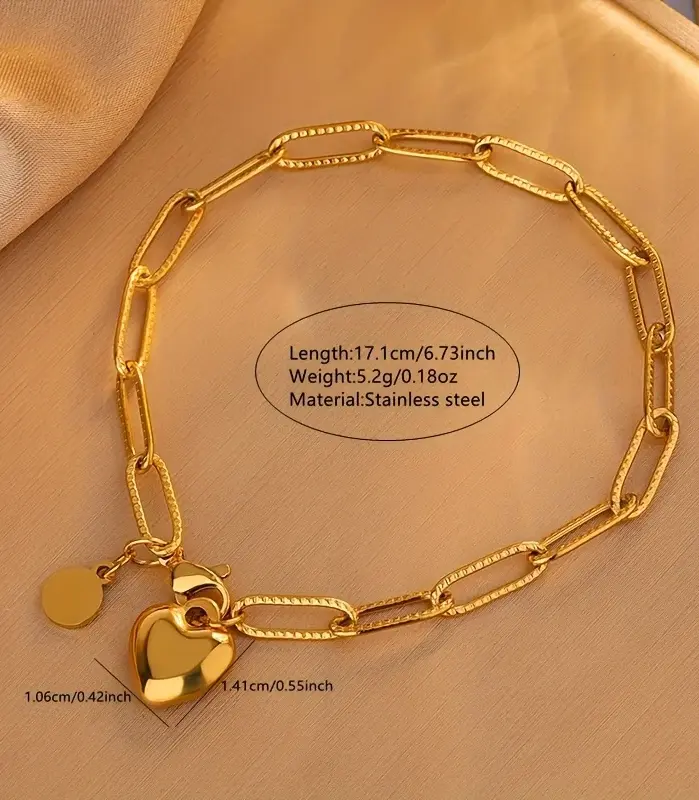Conjunto de Joyería Dorada de Moda 2026: Collar de Cadena de Eslabones Audaces y Pulsera con Dije de Corazón Brillante – Combinación Clásica para Bodas 2