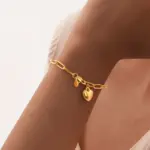 Conjunto de Joyería Dorada de Moda 2026: Collar de Cadena de Eslabones Audaces y Pulsera con Dije de Corazón Brillante – Combinación Clásica para Bodas 4