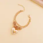 Conjunto de 4 piezas: collar de cadena con colgante de doble corazón, pendientes y pulseras de múltiples capas, de color dorado, para mujer. 6